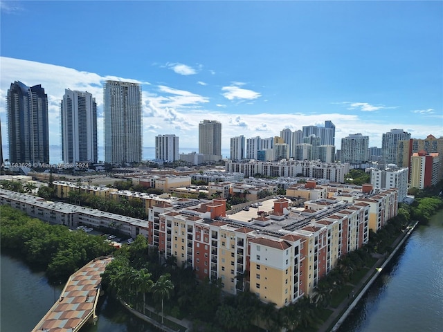 property's view of city featuring a water view