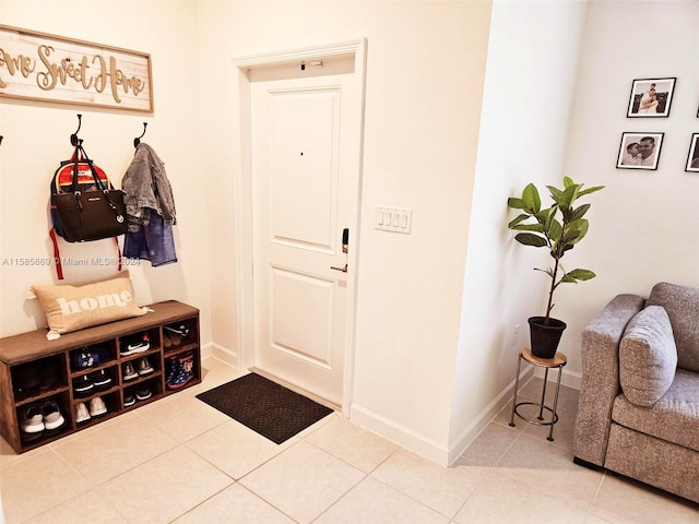 mudroom featuring tile flooring