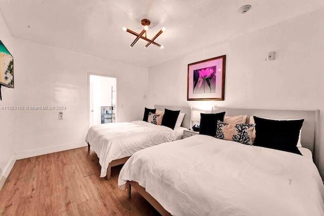 bedroom featuring wood-type flooring