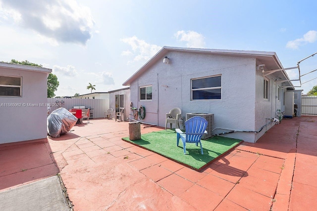 rear view of property with a patio