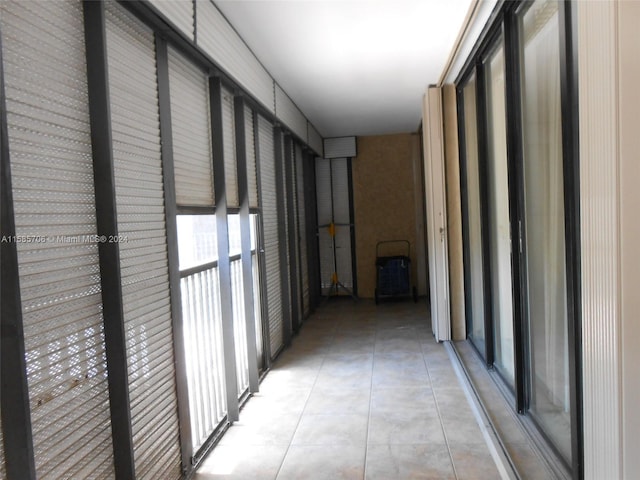 hallway with light tile patterned flooring