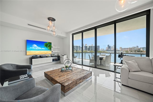 tiled living room with a wall of windows