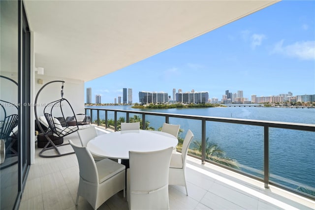 balcony featuring a water view