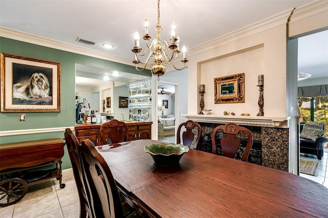 tiled dining room featuring bar area, a notable chandelier, and ornamental molding