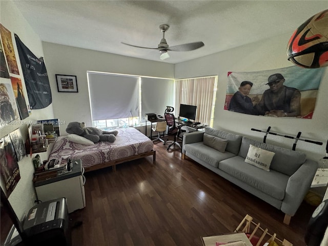 bedroom featuring ceiling fan and hardwood / wood-style flooring