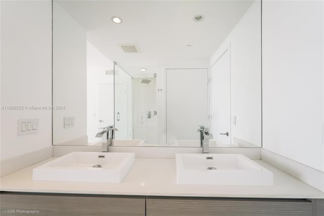 bathroom with dual vanity