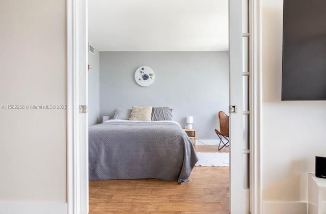 bedroom featuring light hardwood / wood-style flooring