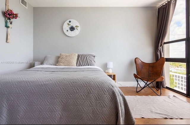 bedroom featuring hardwood / wood-style flooring