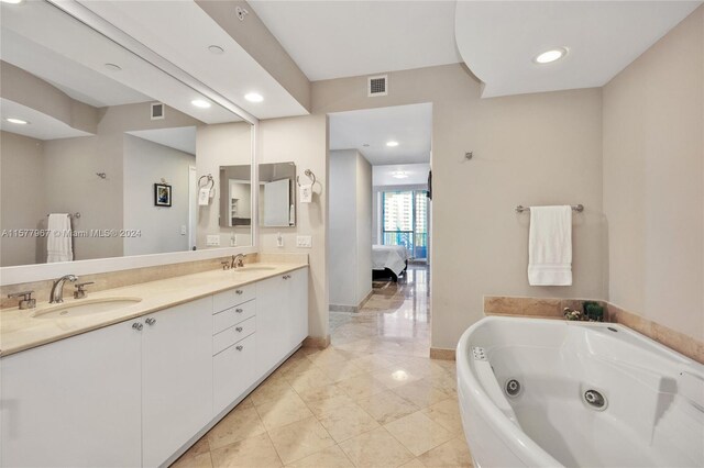 bathroom featuring dual vanity and tile patterned flooring