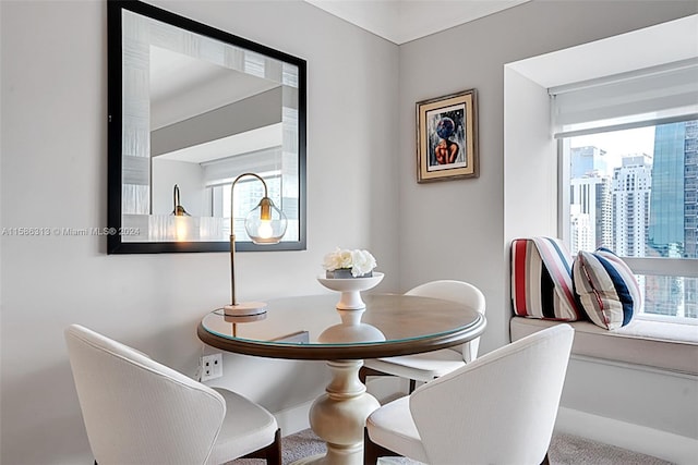 dining space with a healthy amount of sunlight