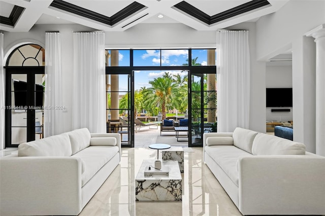 living room featuring a high ceiling, coffered ceiling, beam ceiling, and crown molding