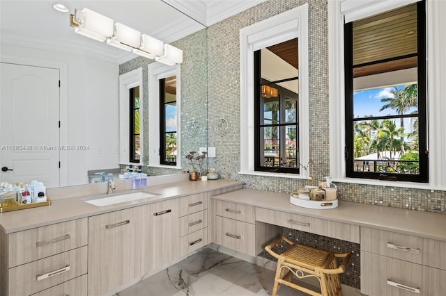 bathroom featuring tile floors, tasteful backsplash, crown molding, and oversized vanity