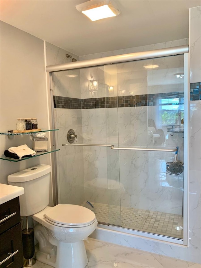 bathroom featuring tile flooring, walk in shower, vanity, and toilet