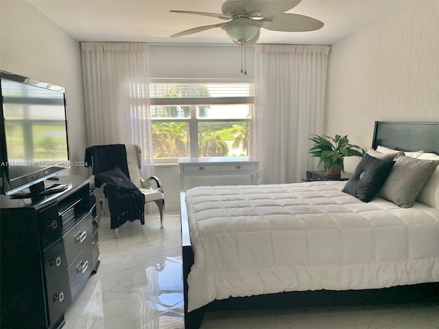 bedroom featuring ceiling fan and light tile flooring