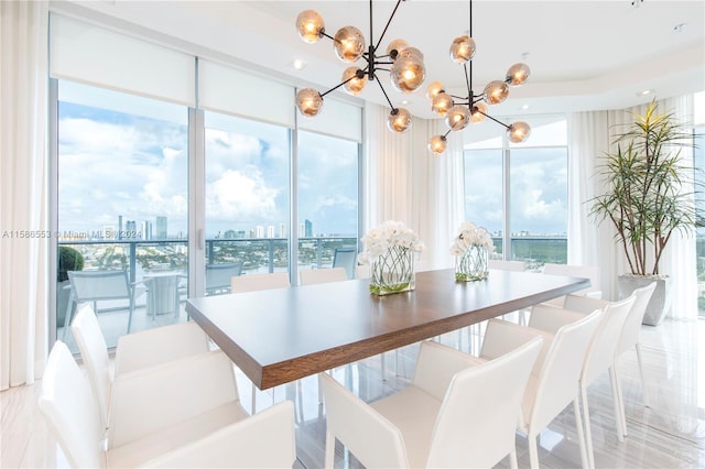 dining space with an inviting chandelier