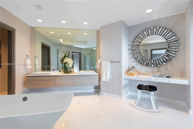 bathroom featuring tile floors, dual vanity, and a bath to relax in