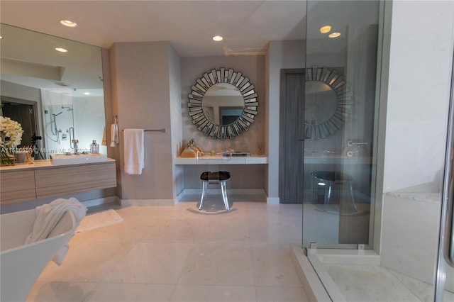 bathroom featuring tile floors, shower with separate bathtub, and vanity