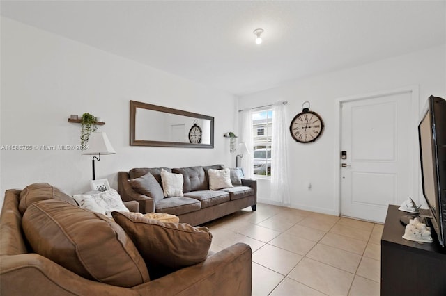 living room featuring light tile patterned flooring