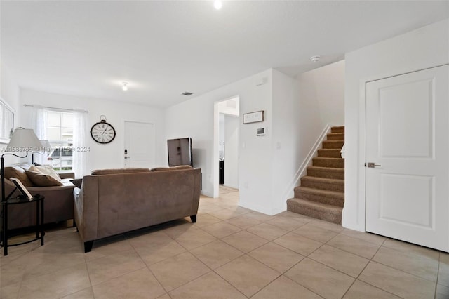 living room featuring light tile patterned floors