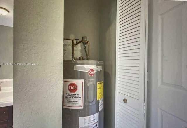 utility room with water heater