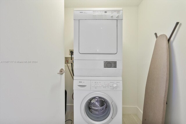 laundry room with stacked washer / dryer, washer hookup, and hookup for an electric dryer