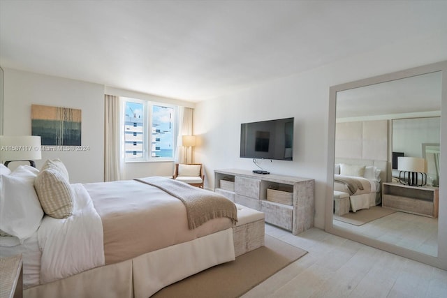 bedroom featuring light hardwood / wood-style flooring