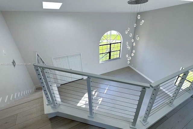 staircase featuring hardwood / wood-style flooring