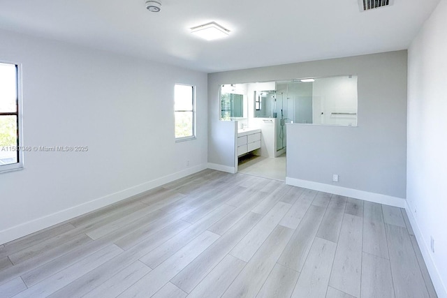 unfurnished bedroom featuring light hardwood / wood-style flooring