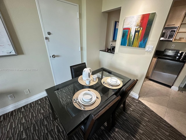 dining room with light tile patterned floors