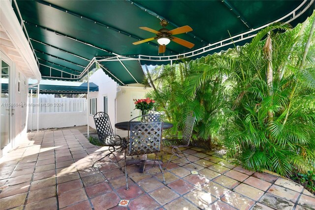 view of patio featuring ceiling fan