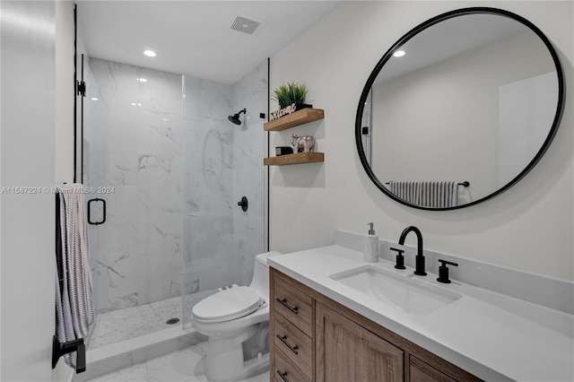 bathroom featuring walk in shower, vanity, and toilet