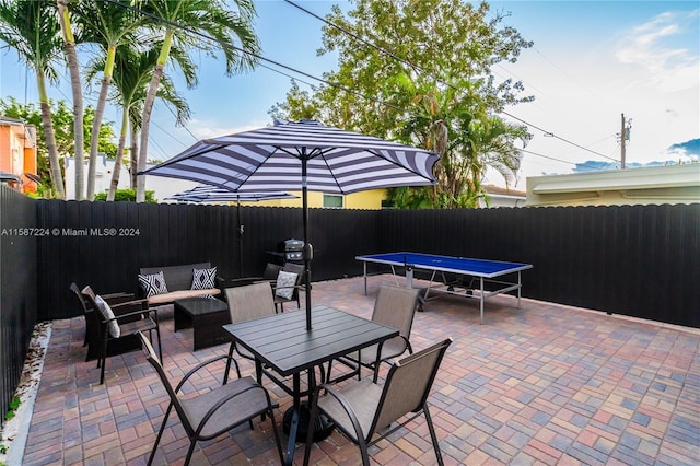 view of patio featuring an outdoor living space and a trampoline