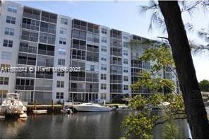 view of property with a water view