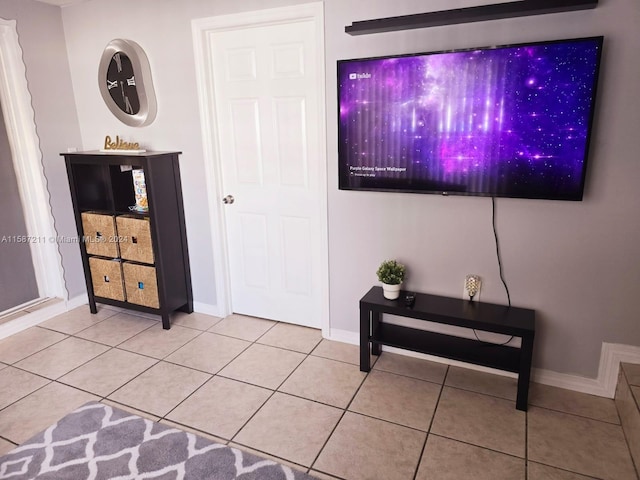 interior space featuring light tile floors