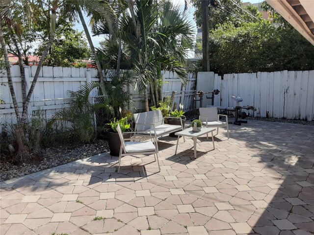 view of terrace with an outdoor living space