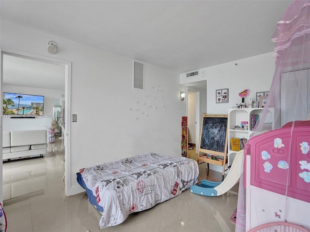 bedroom with tile floors