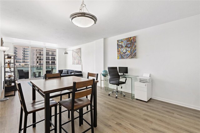 dining room featuring light wood-type flooring