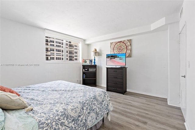 bedroom featuring hardwood / wood-style floors