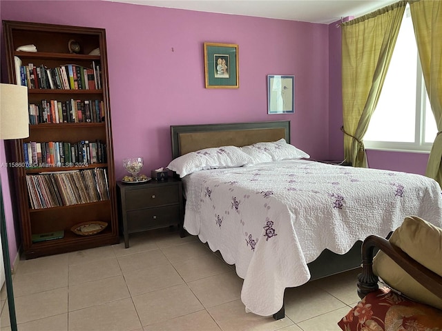 bedroom featuring tile floors