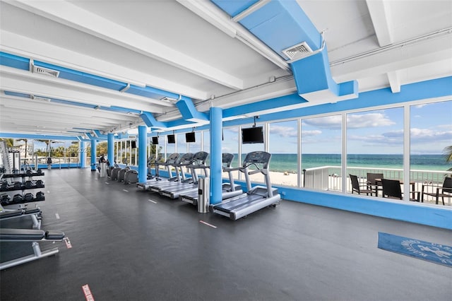 gym with a water view