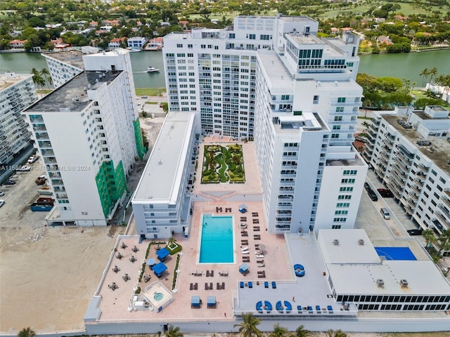 birds eye view of property featuring a water view