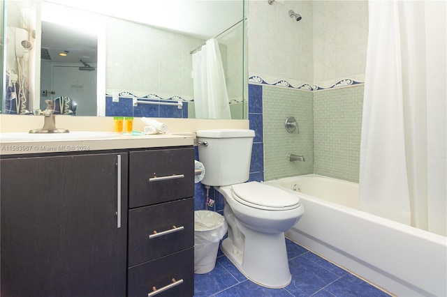 full bathroom featuring shower / bath combination with curtain, vanity, toilet, and tile floors