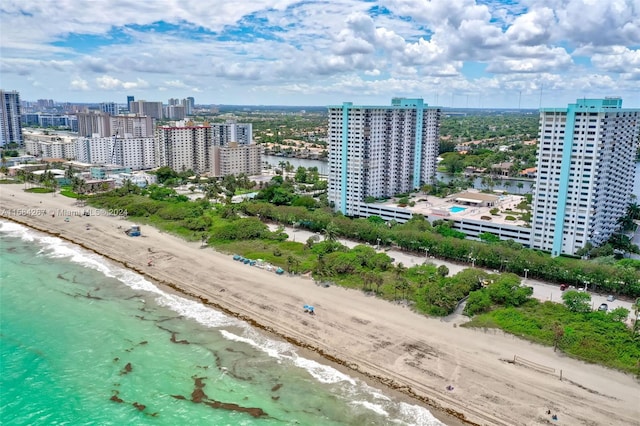 bird's eye view with a beach view and a water view