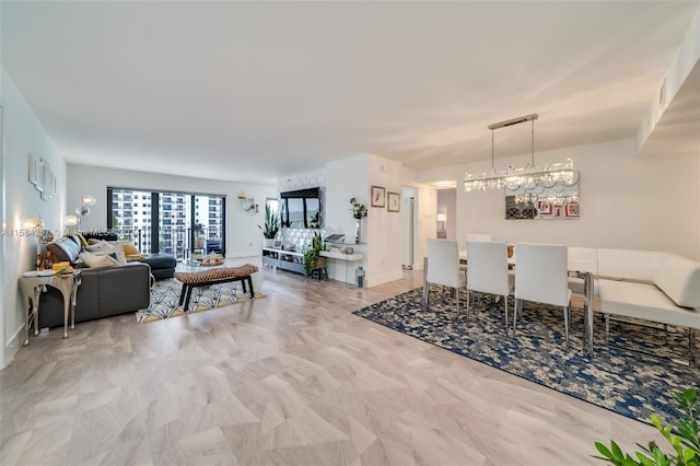 dining area featuring tile floors and an inviting chandelier