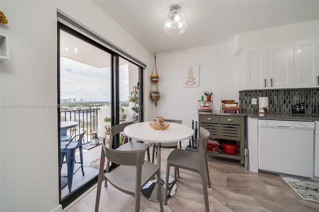 dining room featuring light parquet flooring