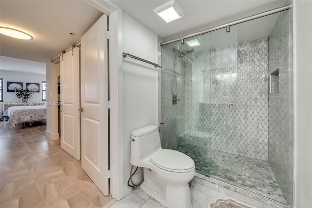 bathroom with parquet floors, an enclosed shower, and toilet