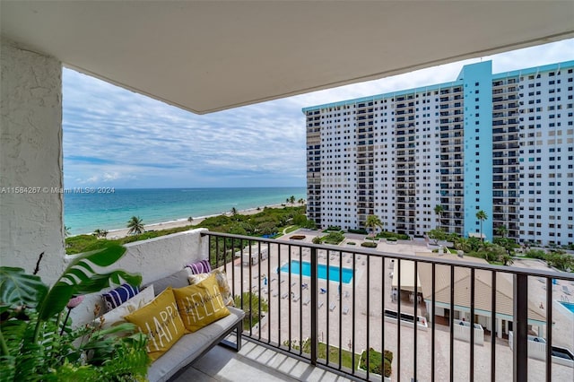 balcony featuring a water view