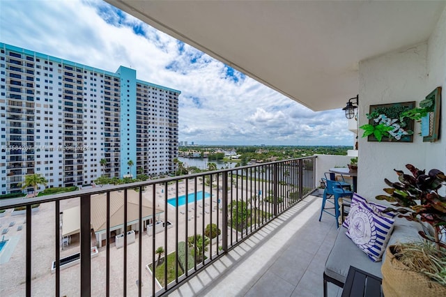 balcony featuring a water view