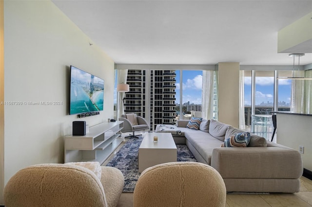 living room with floor to ceiling windows