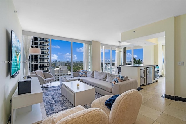 tiled living room with beverage cooler and a wall of windows